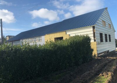 désamiantage de toiture et remplacement couverture, bardage et isolation bâtiment à Chuelle 45